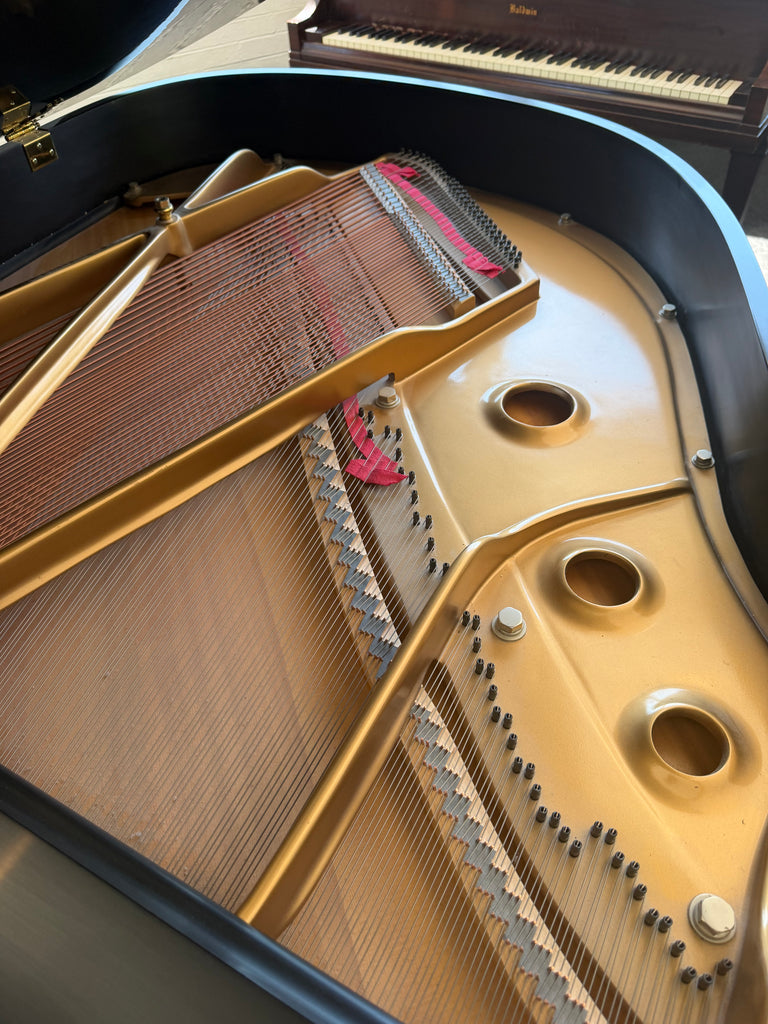 Baldwin model R grand Piano 5’8” in pristine condition. One owner like new.