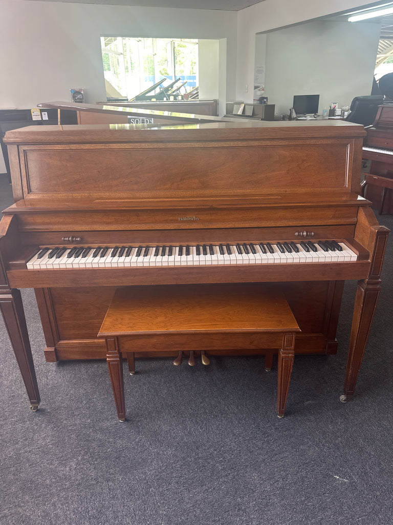 Baldwin console cabinet studio height