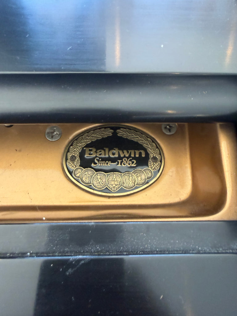 Baldwin model R grand Piano 5’8” in pristine condition. One owner like new.