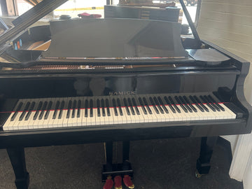 Samick baby grand piano